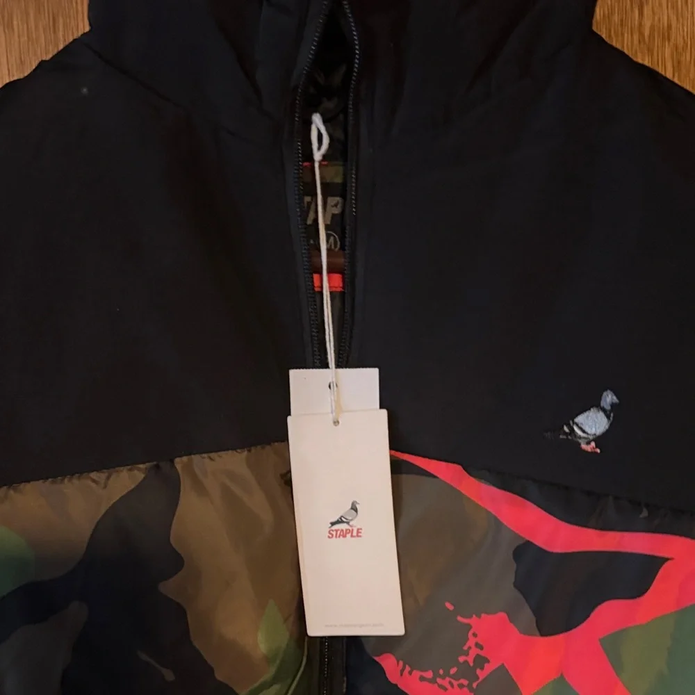 Staple Pigeon Camouflage Puffer Jacket with Neon Pink Accents - Picture 2 of 3